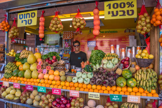 Tel-Aviv, Israel - April 30, 2015: Stall selling fruit and juices in the urban center of the city