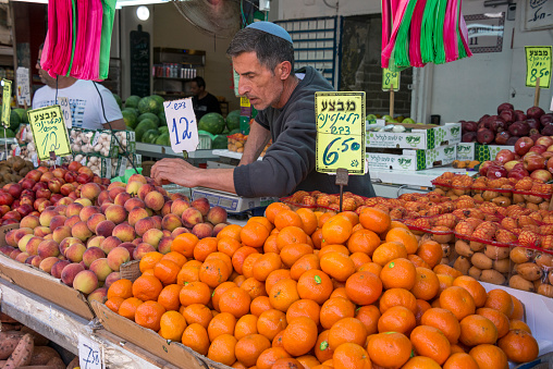 Tel-Aviv, Israel - April 30, 2015: Fruit stand in the Carmel market in the urban center of the city