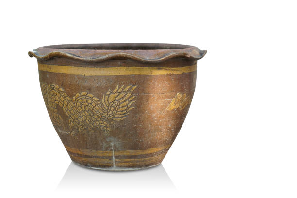 istock old dragon tail clay pot orange and yellow on white background, vintage, nature, ancient, object, decor, copy space 1392409310