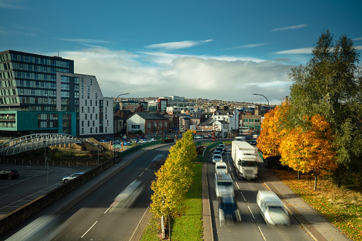 Traffic on Derek Dooley Way in Sheffield, England on a sunny day in Autumn.