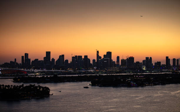 istock Biscayne Bay and Miami Skyline at Dusk 1392417368