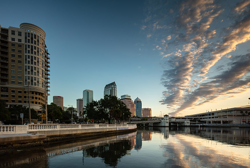 Sunrise in Tampa, Florida from the mouth of the Hillsborough River, looking upstream towards Platt Street Bridge and downtown skyscrapers. This image is part of a series of views taken at different times of day from the same location; a time lapse is also available