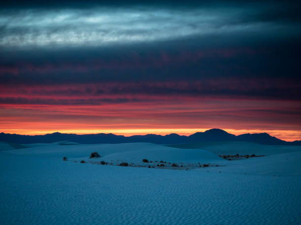 istock Dramatic Sunset in White Sands National Monument 1392417425