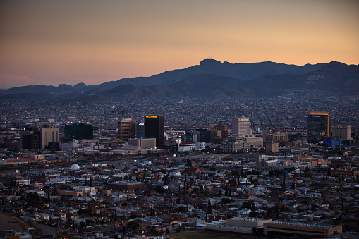 Cityscape looking across El Paso, Texas in the United States and Ciudad Juárez in Chihuahua, Mexico at sunset. This image is part of a series of views taken at different times of day from the same location; a time lapse is also available.