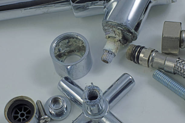 istock Dismantled basin tap/faucet and waste. 1392418657