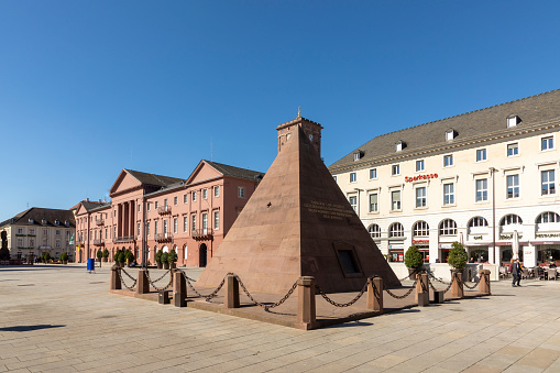 Karlsruhe, Germany - April 17, 2022: Karlsruhe Pyramid, city's founder grave, red sandstone monument located on market square of Karlsruhe.