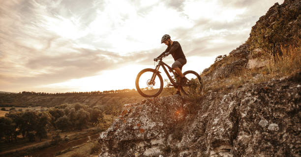 istock Man riding e bike in mountains 1392429064