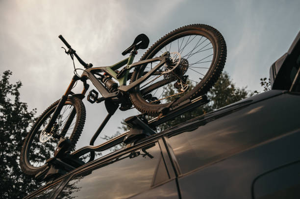istock Bike on modern van roof 1392429083