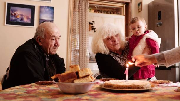 istock First birthday celebration with the family during COVID-19. 1392430421