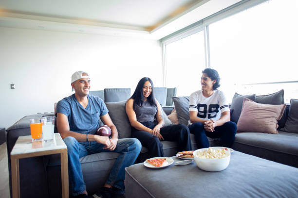 istock Friends at home watching TV 1392435150