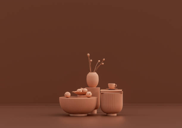 istock Single coffee table with coffee mug, books and fruit plate in monochrome brown room 1392442559