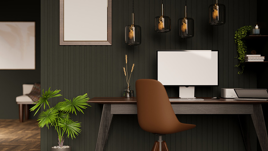 Modern dark elegance office workspace with PC desktop computer against black wall