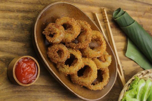 istock Cibitung, West Java, April 17, 2022, pieces of fried flour squid with sauce 1392445798