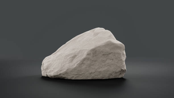 istock Single color white rocks in a flat grey color background  monochrome rock model 1392446447