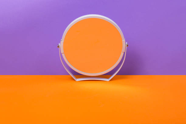 istock Abstract still life with a round mirror on a colored background 1392450554