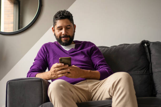 istock Latin man shopping online 1392454537