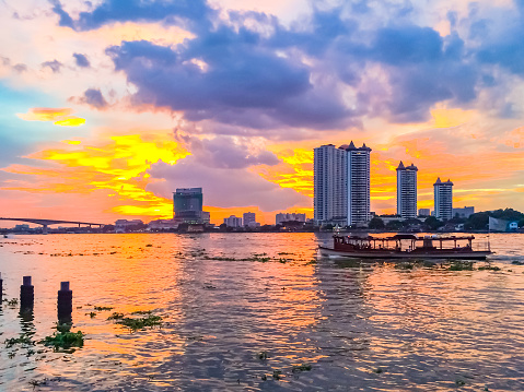 Sunset on the river bank in bangkok, Chao Phraya