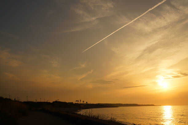 Sunset sky and sea dyed orange