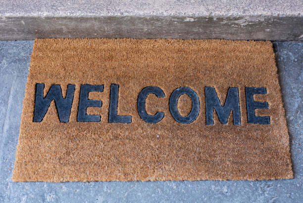 istock Welcome word on dirty doormat 1392464799