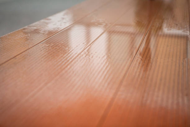 istock Rain landing on empty exterior cafe tables 1392466400