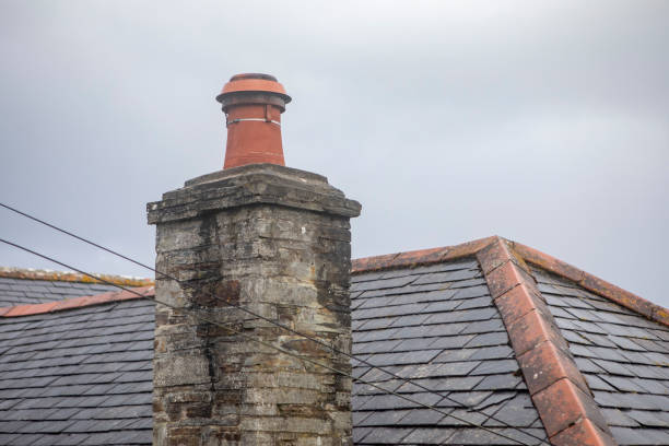 Roof top of an old building in Cambridge, England showing the detail in the rof tiles.