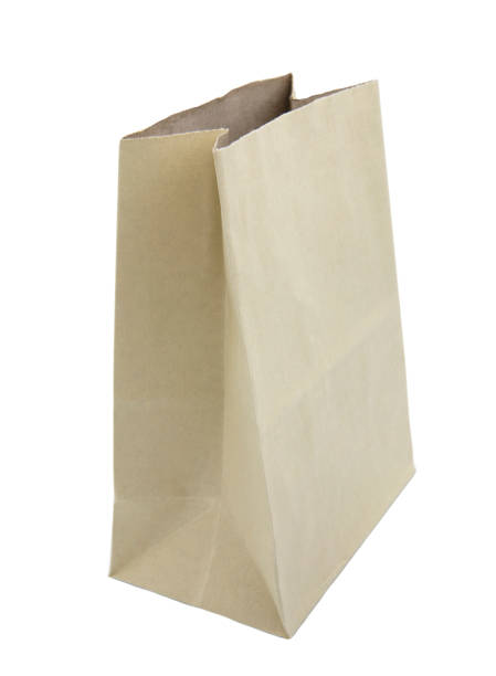 istock Empty paper bag for takeaway isolated on white background.. 1392468346