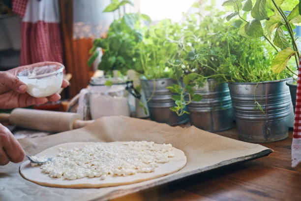 istock Preparing Vegan Pizza with Avocado 1392470628