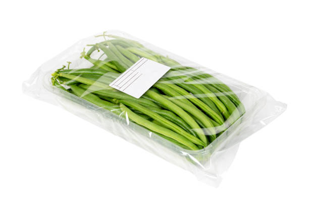 Fresh harvest french beans packaged and labeled on a white background