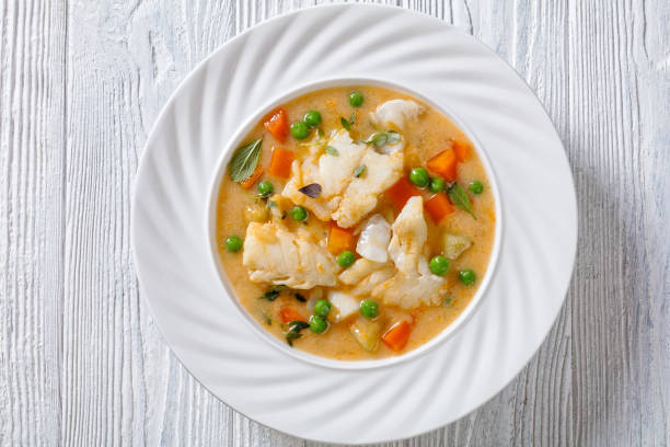 istock white fish chowder with green peas, potatoes 1392472179