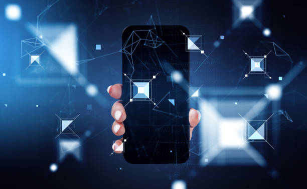 istock Businesswoman is holding smartphone in her hand. Digital interface 1392472266