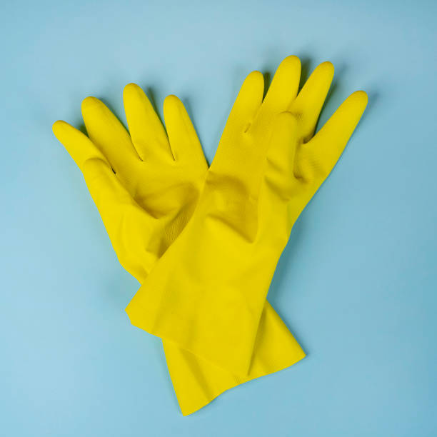 istock yellow rubber cleaning gloves 1392472451