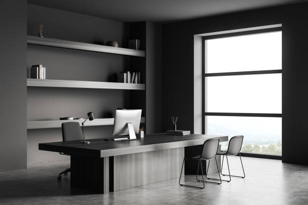 istock Grey office interior with chairs and work desk, decoration and panoramic window 1392472459