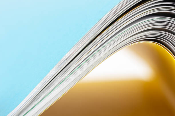 istock Edges of opened book as abstract curves 1392472535