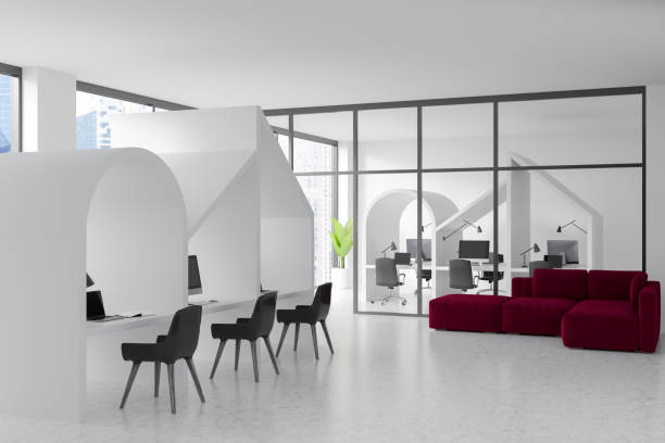 istock Top view of light office interior with chairs and table, decoration and window 1392473595