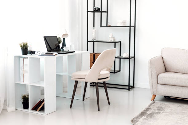 istock Comfortable and cozy workplace with laptop at home. 1392474755