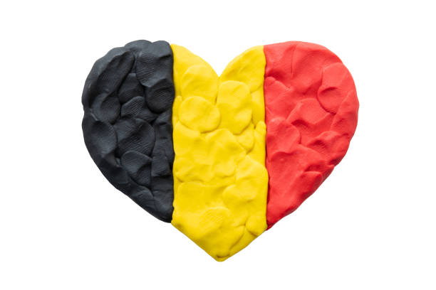 black, yellow and red flag of belgium, belgian flag. heart shape of tricolour flag plasticine modeling clay isolated on white background. plasticine finger textured background. top view, close-up. - 比利時皇室 個照片及圖片檔