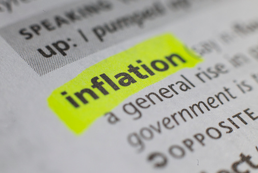 The word inflation printed and defined in an English dictionary
