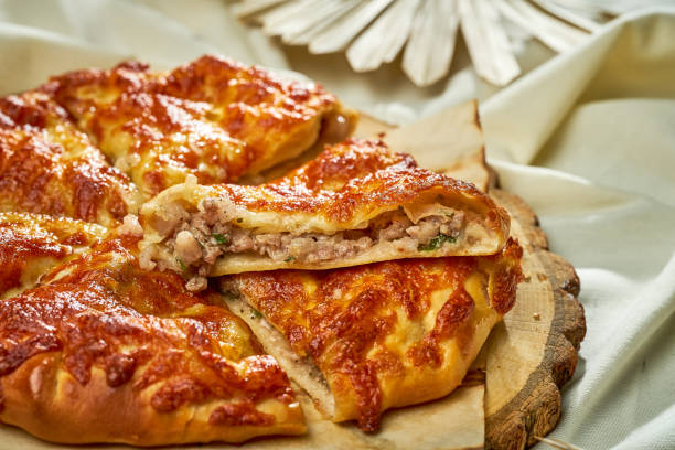 istock Kudbari or khachapuri with meat in the cut. A selective focus 1392479800