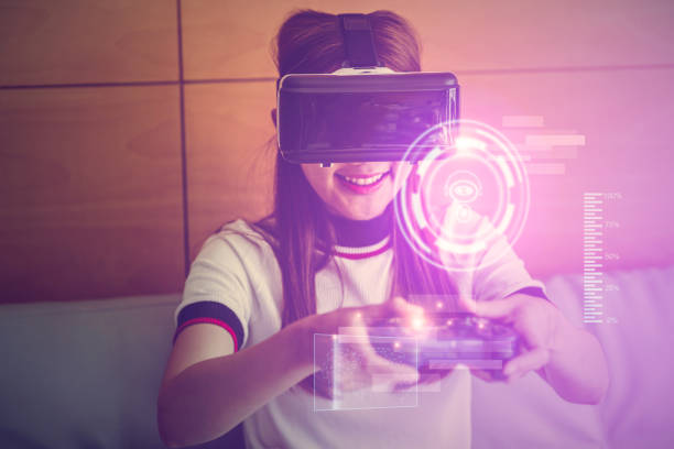 istock Young attractive Asian woman using VR-headset glasses to playing metaverse VR technology concept. 1392480226
