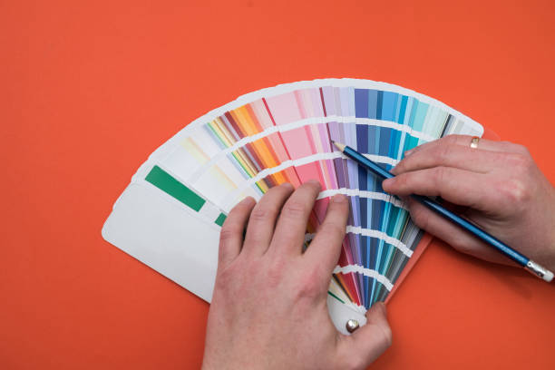 istock male hand choose color in palette samples 1392486302