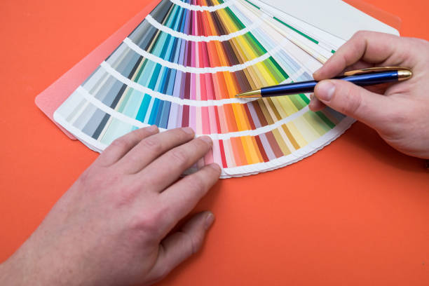 istock male hand choose color in palette samples 1392486468