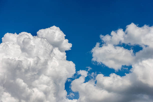 istock Beautiful Cumulus Clouds on Clear Blue Sky - Photography Full Frame 1392487827