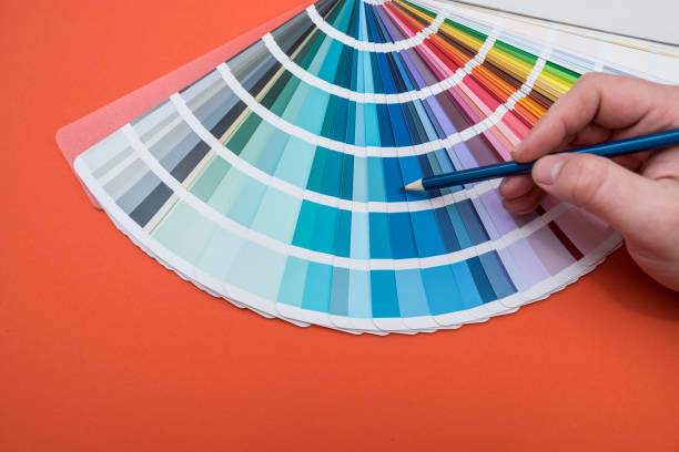 istock male hand choose color in palette samples 1392488075