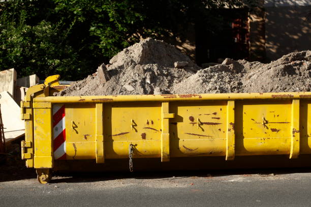 Container, yellow settling trough for construction rubble standing on the road Germany, Europe Container, yellow skip for construction rubble standing on the road Germany, Europe erde stock pictures, royalty-free photos & images