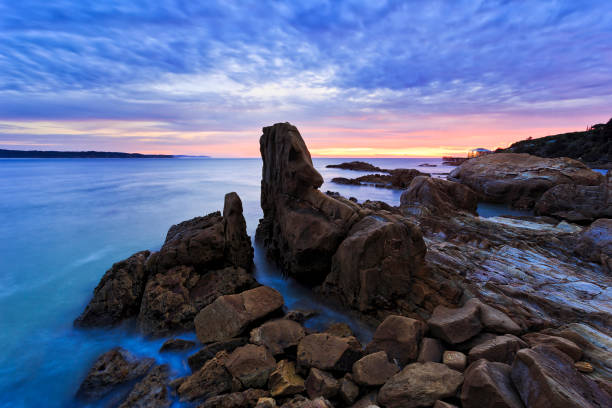 istock Sea Tathra Rocks dark rise 1392488197
