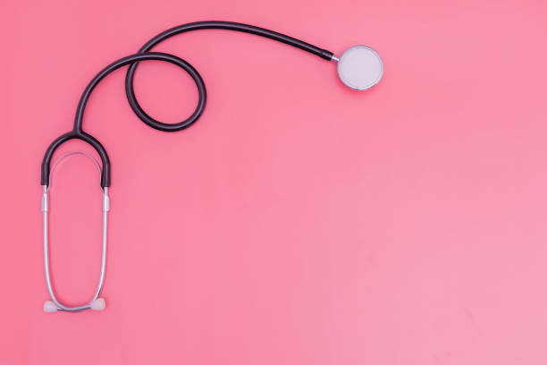 istock stethoscope on pink background and copy space 1392489144