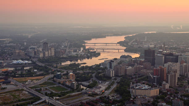 istock Ottawa River flowing below bridges through cityscape 1392492049