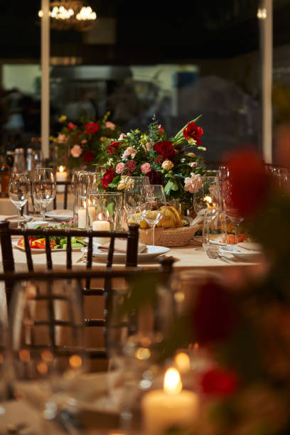 istock transparent wine glasses on a beautiful festive table decorated with flowers 1392493342