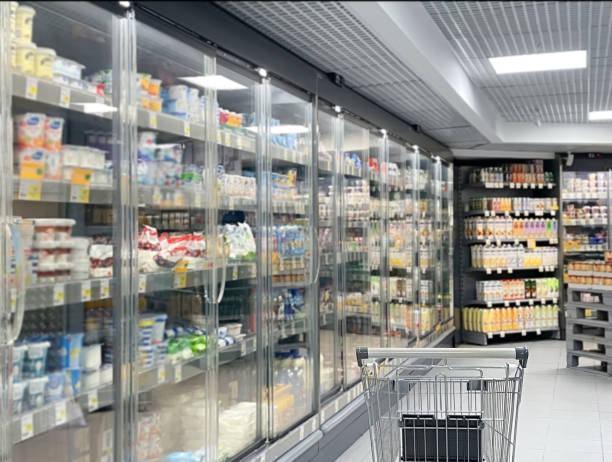 istock empty grocery cart in an empty supermarket 1392497746