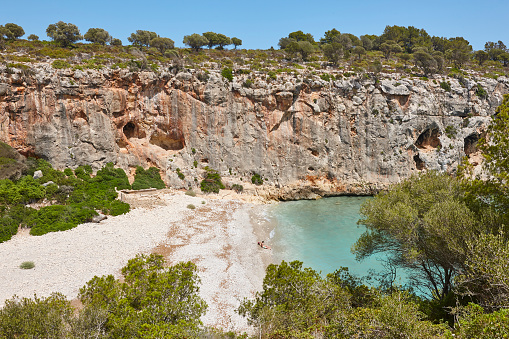 Turquoise waters in Mallorca. Magraner cove. Mediterranean coastline. Spain
